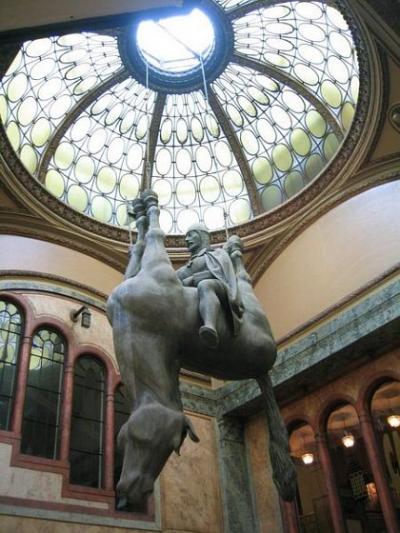 upside down horse statue